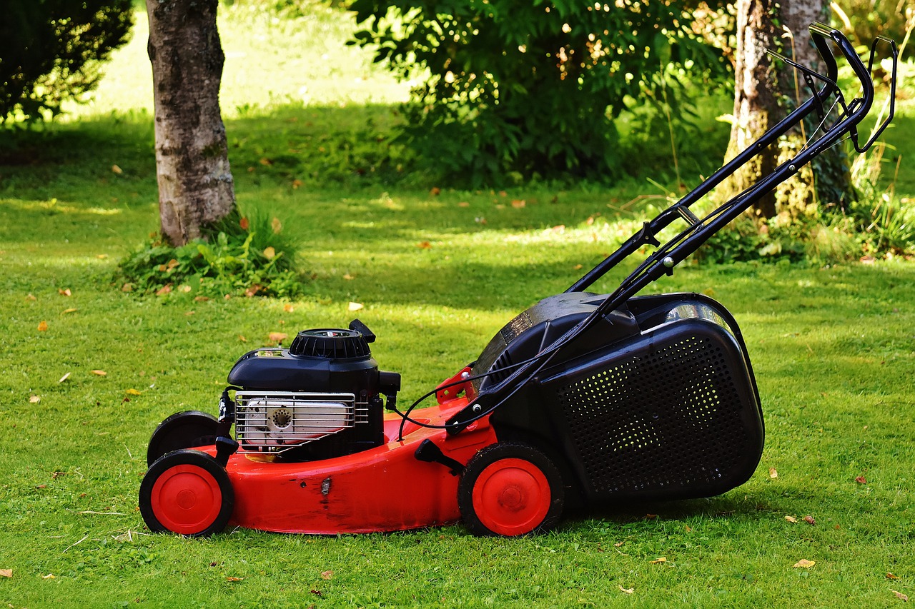 red lawnmower on lawn